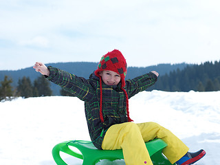 Image showing happy young boy have fun on winter vacatioin on fresh snow