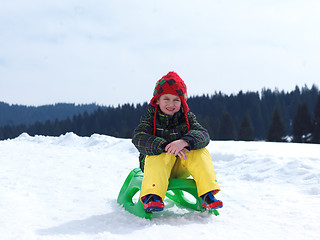 Image showing happy young boy have fun on winter vacatioin on fresh snow