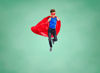 Image showing boy in super hero cape and mask showing thumbs up