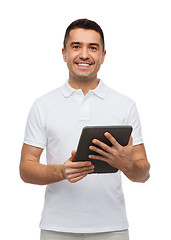 Image showing smiling man with tablet pc computer