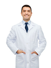 Image showing smiling male doctor in white coat