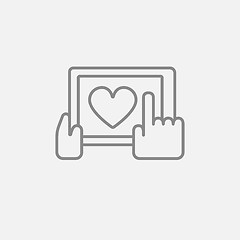 Image showing Hands holding tablet with heart sign line icon.