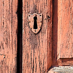 Image showing door    in italy old ancian wood and traditional  texture nail