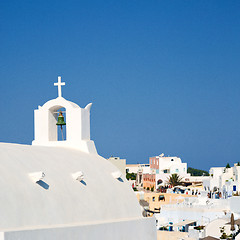 Image showing cross  in santorini greece old construction and the sky