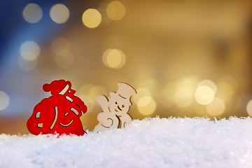 Image showing Santa and snowman with bokeh lights