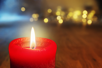 Image showing red burning candle background