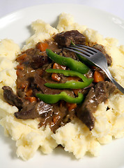 Image showing Liver and onion meal vertical