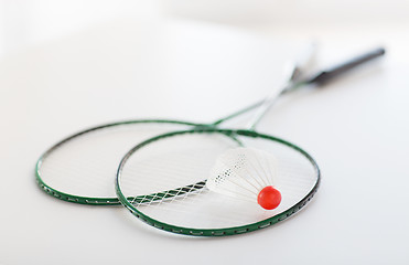 Image showing close up of badminton rackets with shuttlecock