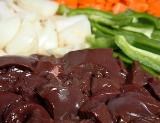 Image showing Raw liver and onions, horizontal