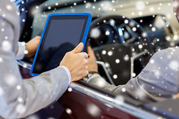 Image showing close up of men with tablet pc and cabrio car