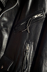 Image showing close up of traditional black classic leather biker jacket