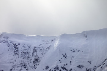 Image showing Sunlight off-piste slope in mist