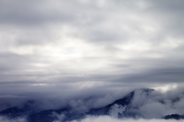 Image showing Winter mountains covered with clouds