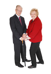 Image showing Beautiful senior couple with umbrella.