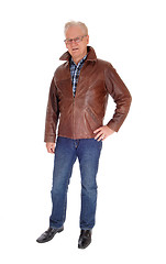 Image showing Senior man in leather jacket standing.