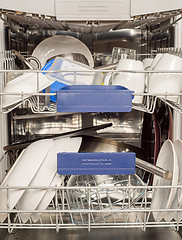 Image showing Utensils in dishwasher