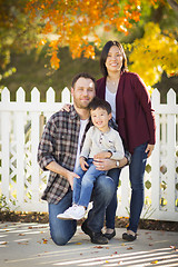 Image showing Mixed Race Young Family Portrait Outdoors