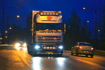 Image showing Nighttime DAF XF Flower Truck and City Lights