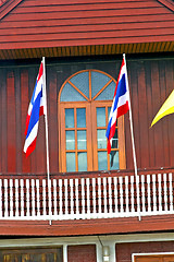 Image showing temple   in  bangkok thailand incision red  waving flag 