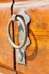 Image showing europe   in  italy    brown door and rusty lock  closeup