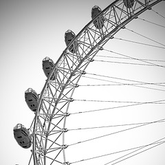 Image showing london eye in the spring sky and white clouds