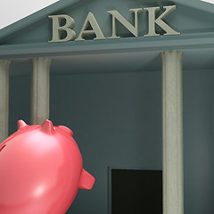 Image showing Piggybank Entering Bank Showing Monetary Lift