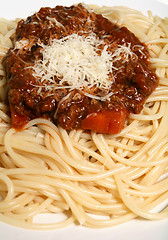 Image showing Spaghetti bolognese with parmesan vertical