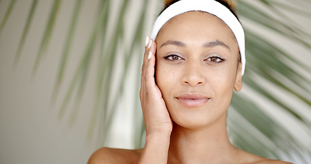 Image showing Woman With Makeup Touching Her Face