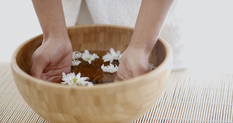 Image showing Female Hands With Bowl Of Aroma Water