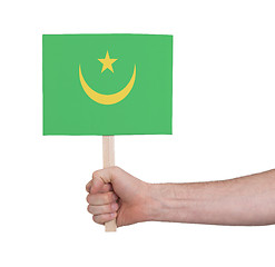 Image showing Hand holding small card - Flag of Mauritania