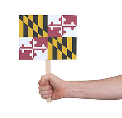 Image showing Hand holding small card - Flag of Maryland