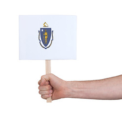 Image showing Hand holding small card - Flag of Massachusetts