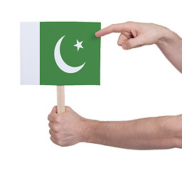 Image showing Hand holding small card - Flag of Pakistan