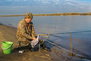 Image showing Fisherman at the river