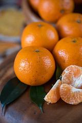 Image showing tangerines on wooden background