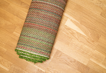 Image showing rolled carpet on the floor