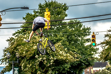 Image showing bmx extreme team making stunt in downtown york south carolina at