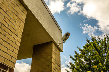 Image showing Three security cameras attached on the office building corner