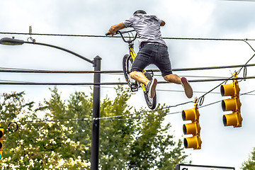 Image showing bmx extreme team making stunt in downtown york south carolina at