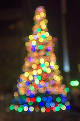 Image showing defocused christmas tree lights in a city background