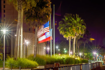 Image showing usa flag waving in the wind near river in savannah georgia at ni