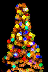 Image showing defocused christmas tree lights in a city background