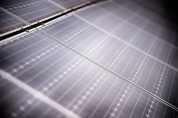 Image showing green energy solar panels on a cloudy day