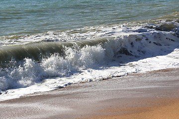 Image showing Wave on the sand beach