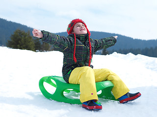 Image showing happy young boy have fun on winter vacatioin on fresh snow