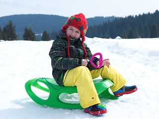 Image showing happy young boy have fun on winter vacatioin on fresh snow