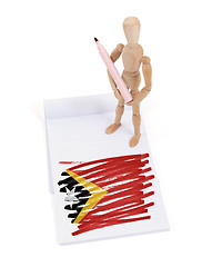 Image showing Wooden mannequin made a drawing - East Timor