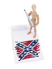 Image showing Wooden mannequin made a drawing - Confederation Flag