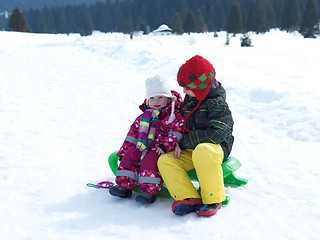 Image showing portrait of boy and baby girl on winter vacation