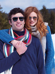 Image showing happy young couple having fun on fresh show on winter vacation